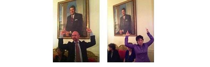 Gay pride in all its glory... flipping the bird at a presidential portrait